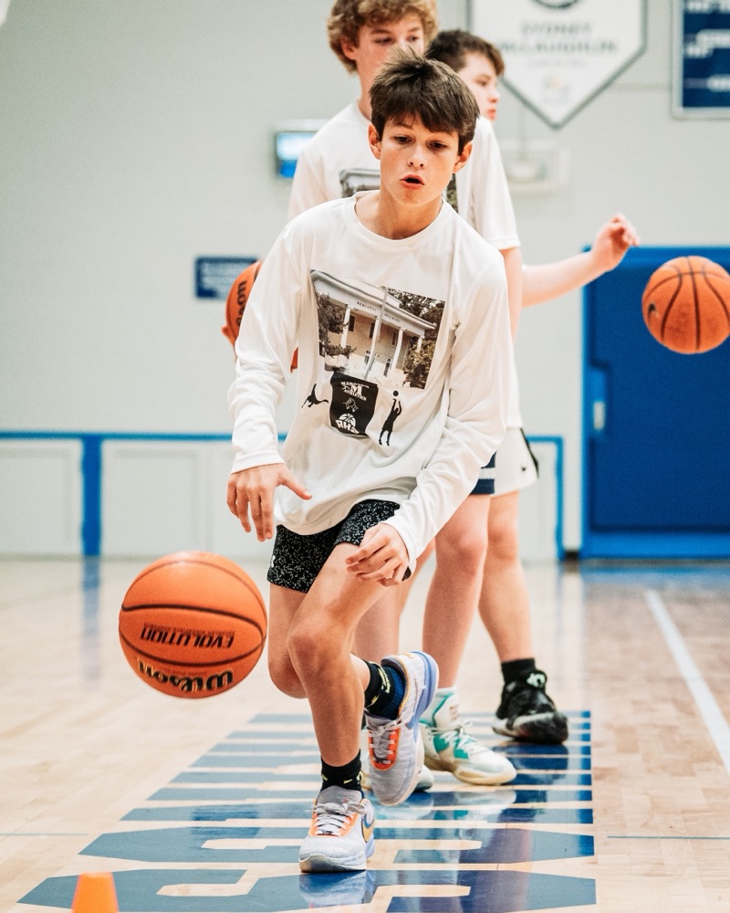 Player working through a dribbling drill at a Marston Athletics workout